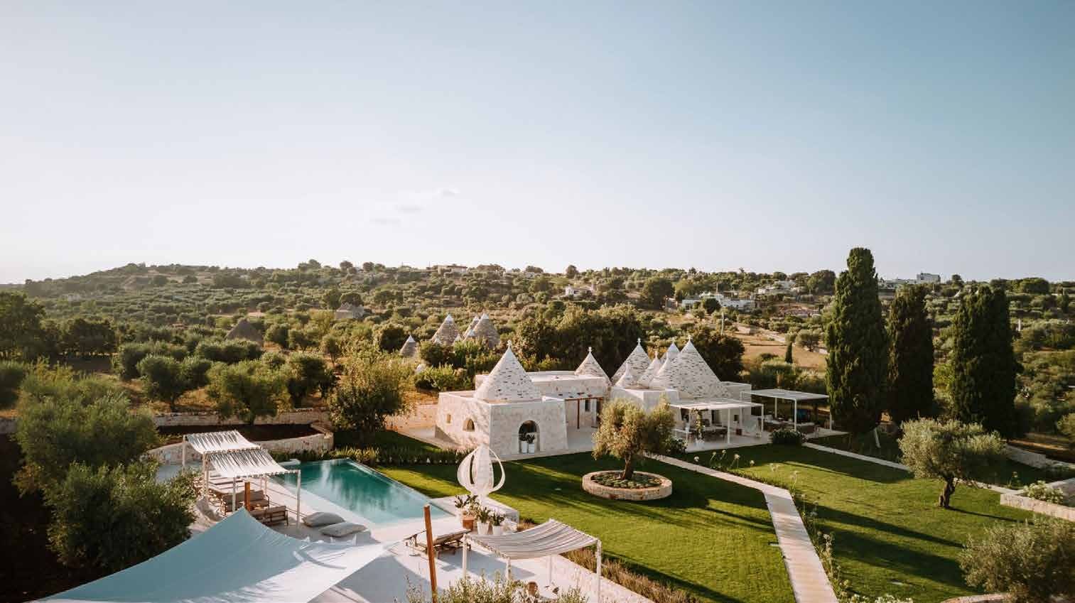 Trulli villa among olive groves in Apulia