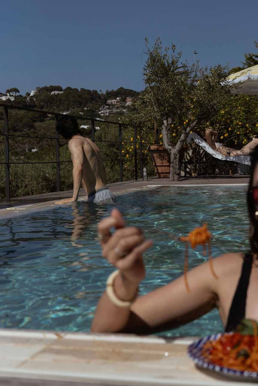 Guests lunching in the pool