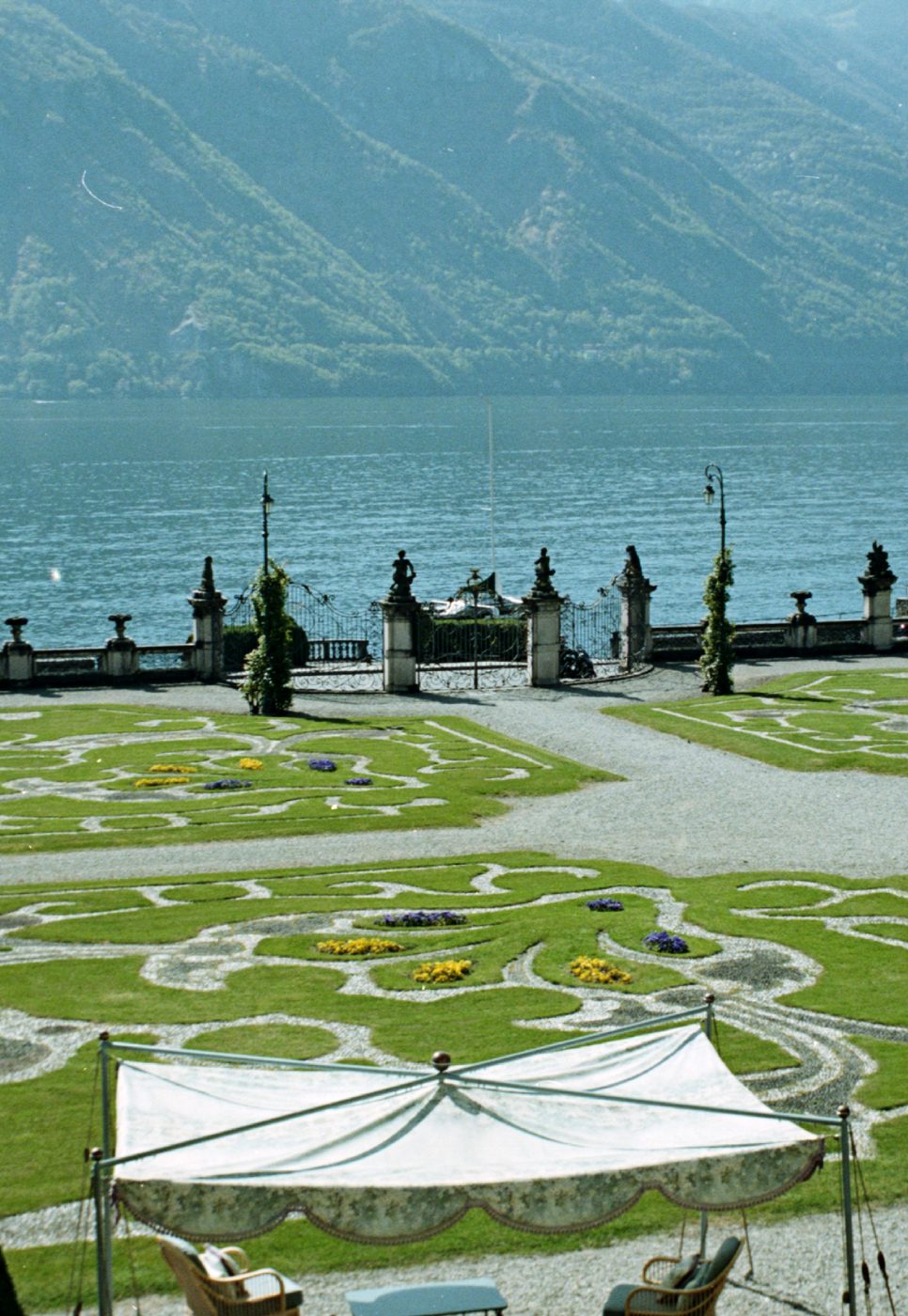 Lakeside parterre garden with a white pavilion