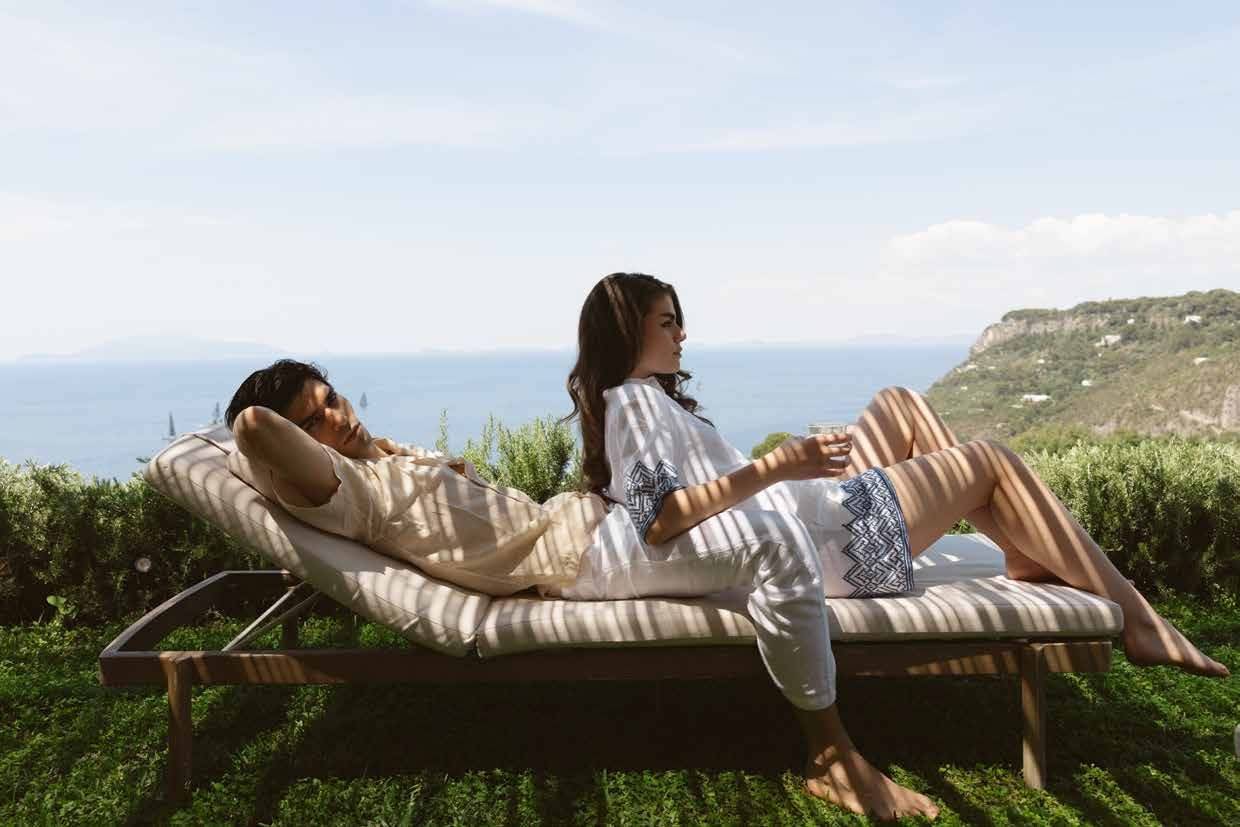 Two guests on a sun lounger