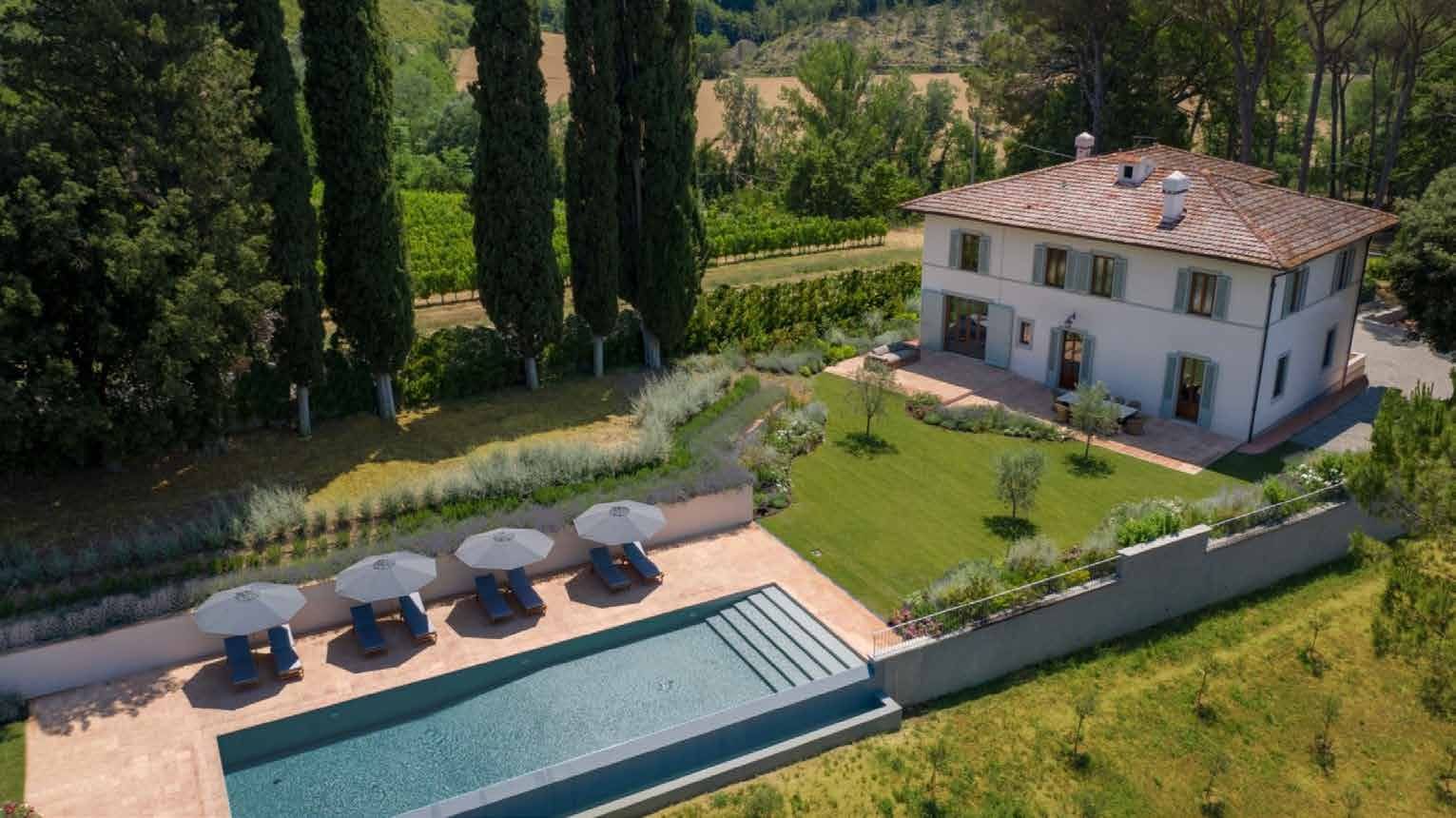 Tuscan villa with pool and cypresses